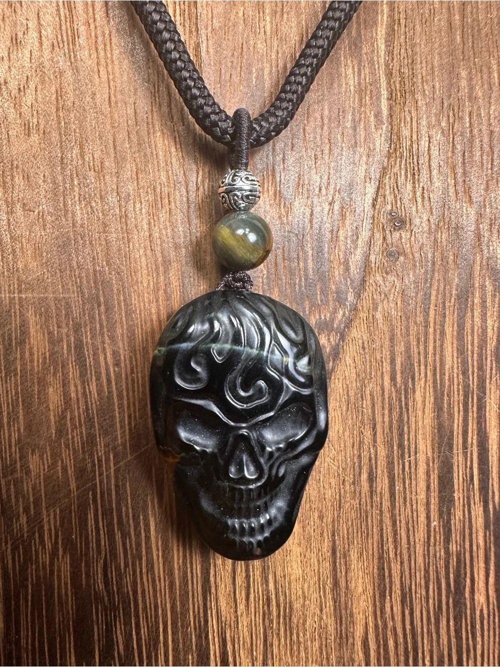 Unique Blue and Golden Tiger’s Eye Skull Carving Pendant Necklace on Brown